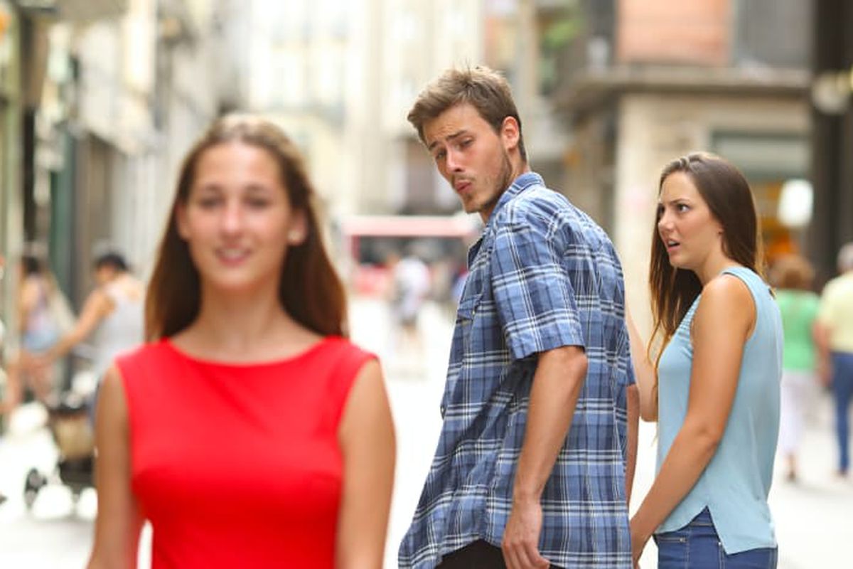 Distracted Boyfriend meme about Caitlyn Minimalist