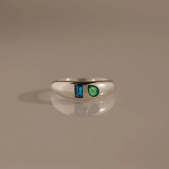 Silver Toi et Moi Dome Ring with a blue rectangular stone and a round green stone